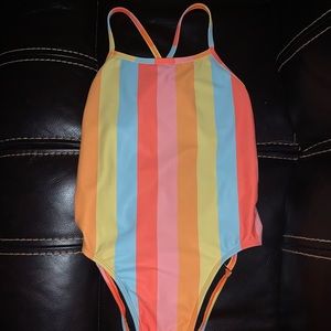 Jolyn “Nico” striped one-piece swimsuit